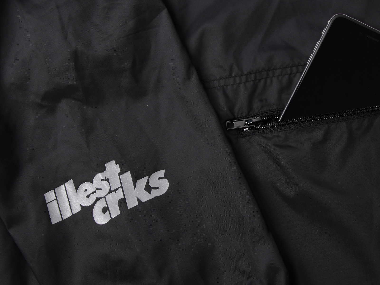 ILLEST CRKS Lineup: graphic tees, anorak, caps, and shorts 
